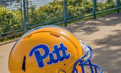 Pitt Football Helmet overlooking Pittsburgh